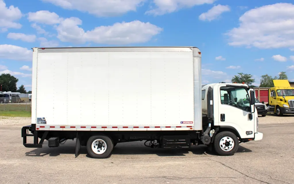 2019 Isuzu NPR HD white Morgan box truck passenger side profile