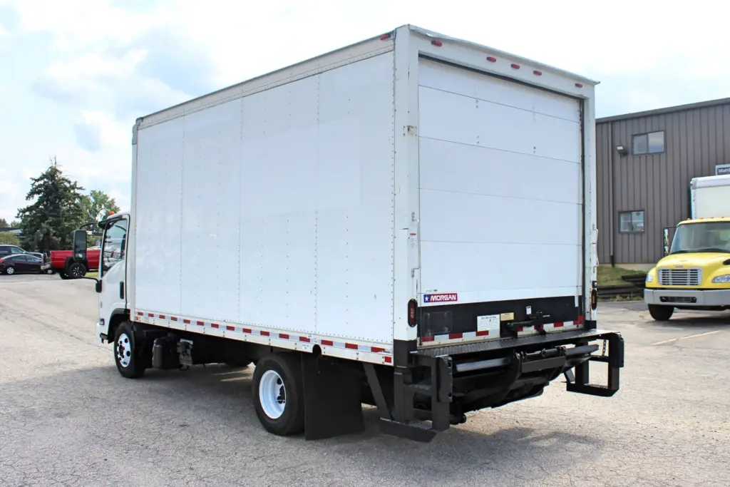 2019 Isuzu NPR HD white box truck rear driver side view