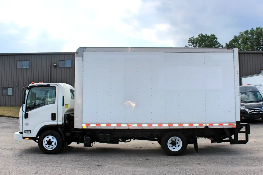 2019 Isuzu NPR HD white Morgan box truck driver side profile