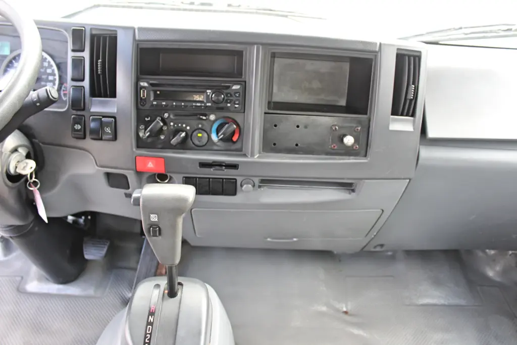 2019 Isuzu NPR HD dashboard radio climate controls and shifter