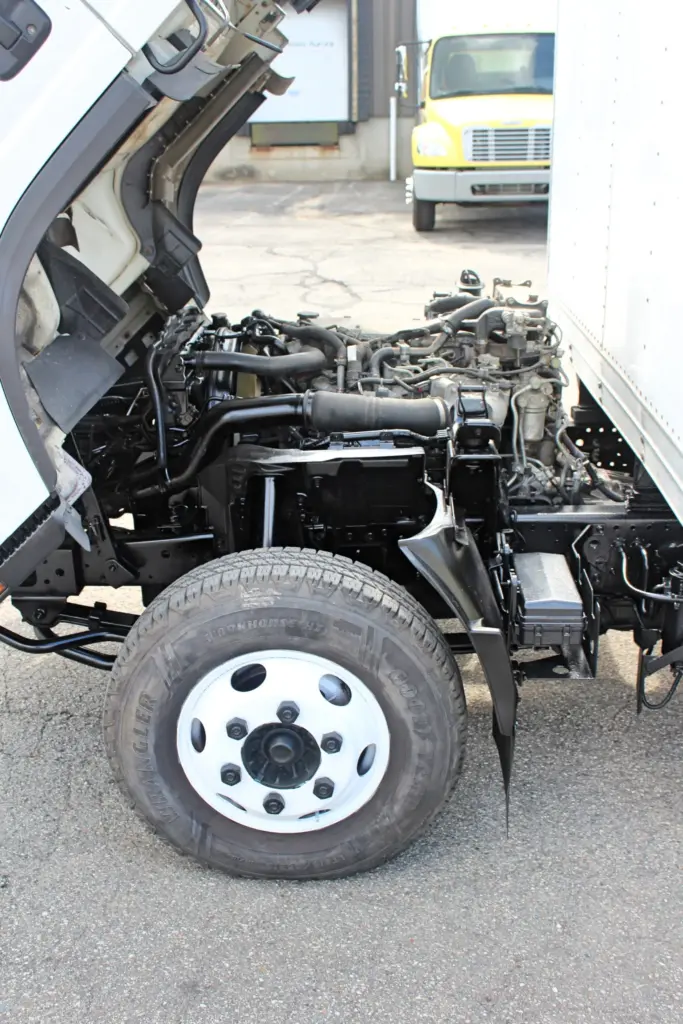2019 Isuzu NPR HD engine compartment with cab tilted open