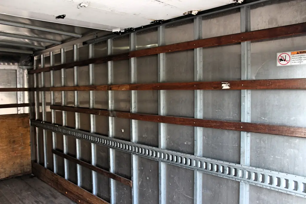 2019 Isuzu NPR HD cargo box interior passenger side wall