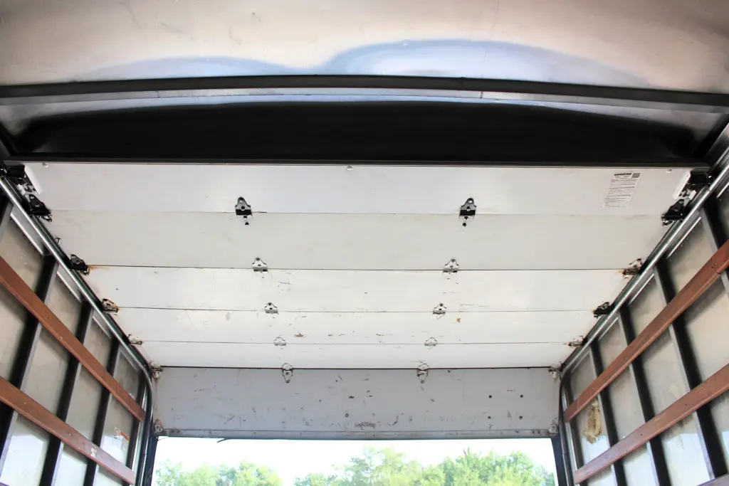 2019 Isuzu NPR HD rear roll-up door interior view
