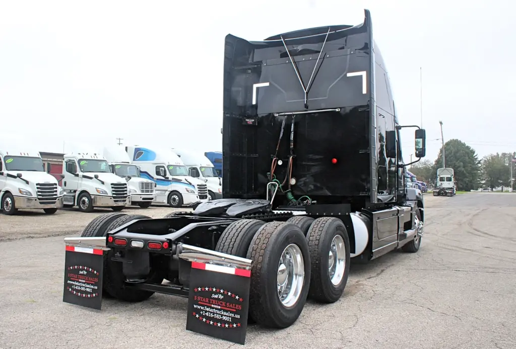2023 Mack Anthem – black sleeper tractor rear three-quarter view