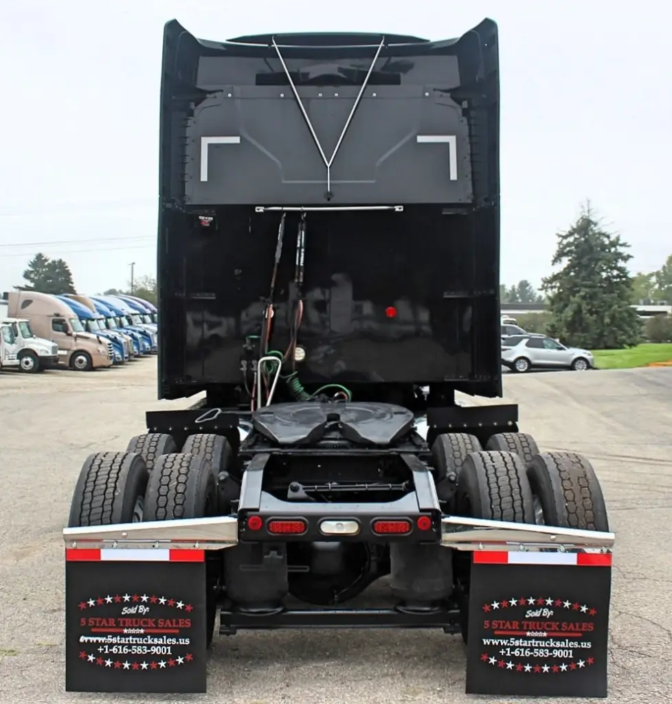 2023 Mack Anthem – rear view of sleeper semi truck and tandem axles