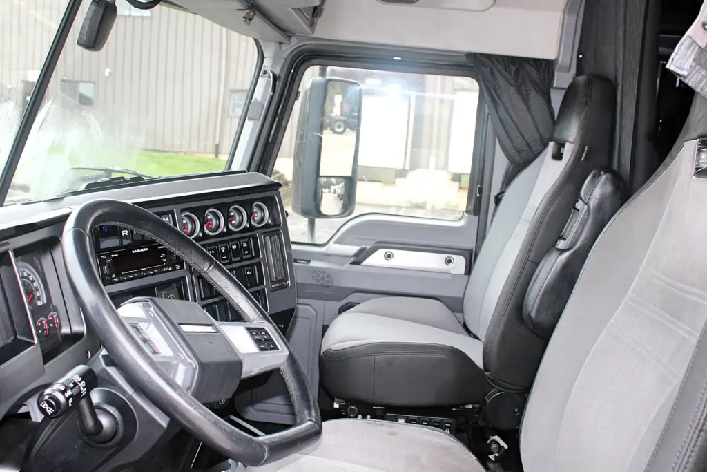 2023 Mack Anthem – clean cab interior with driver and passenger seats