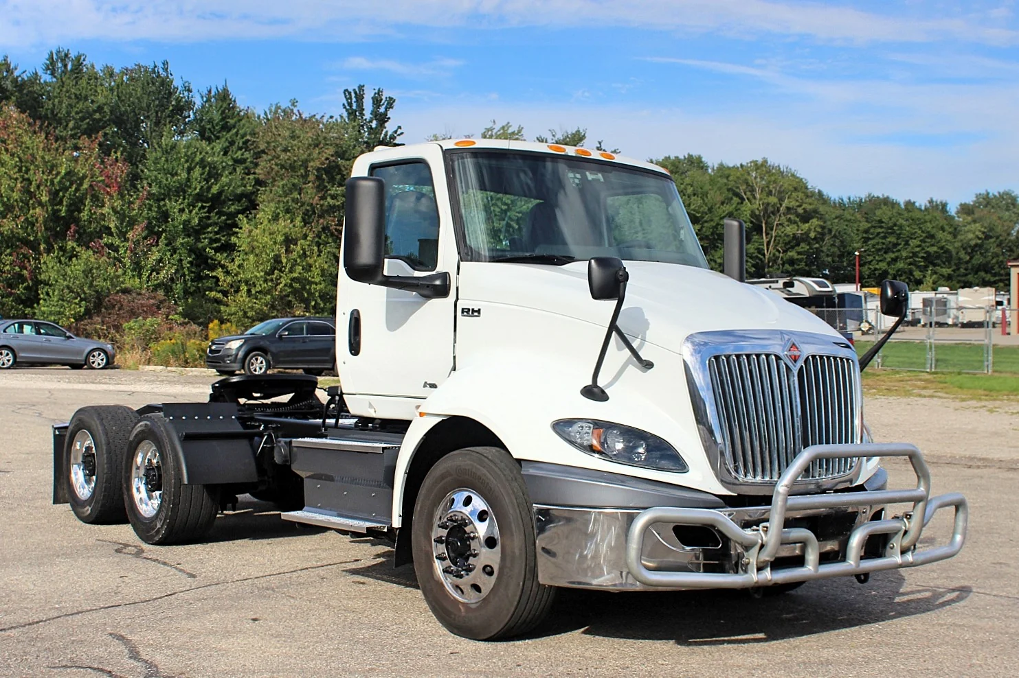 2020 International RH613 white tandem axle day cab truck front three-quarter view