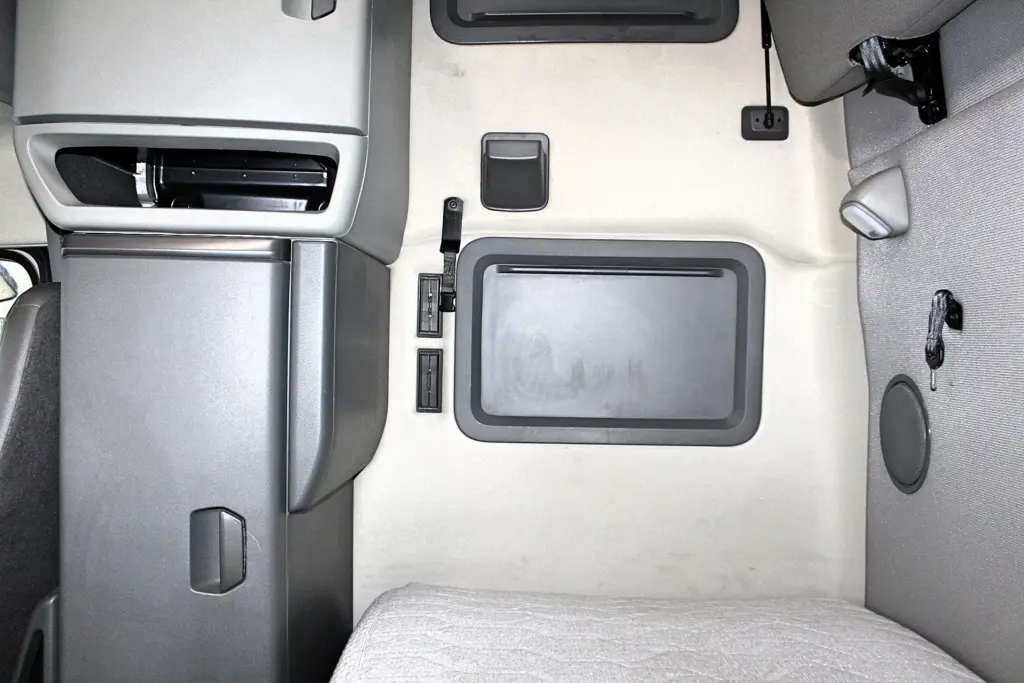 2022 Volvo VNL 760 – sleeper interior with bunk storage and rear window