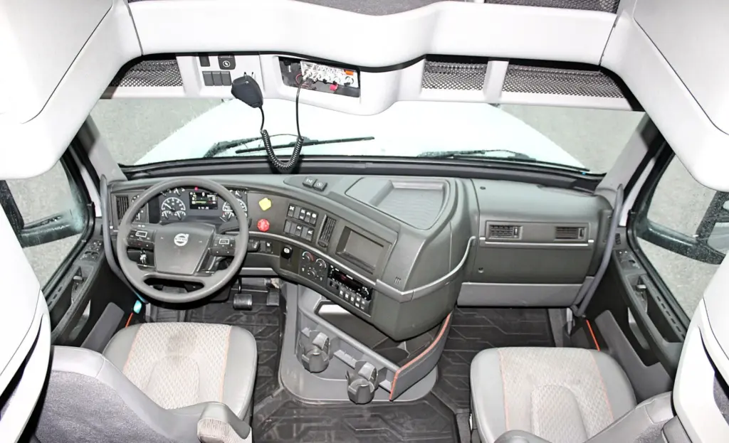 2022 Volvo VNL 760 – wide cab interior view from sleeper toward dashboard