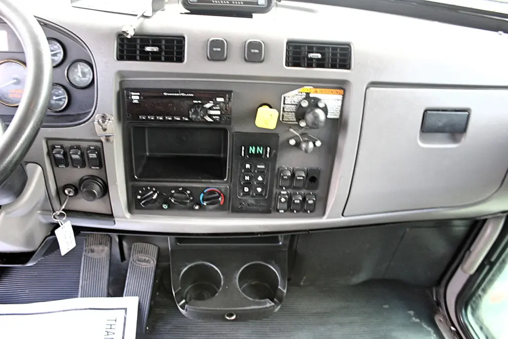 2018 Peterbilt 348 box truck – dashboard controls with automatic transmission selector and climate controls