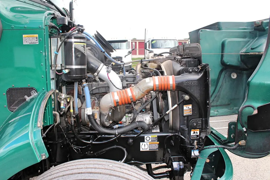 2018 Peterbilt 348 box truck – opposite-side diesel engine compartment view with hood open