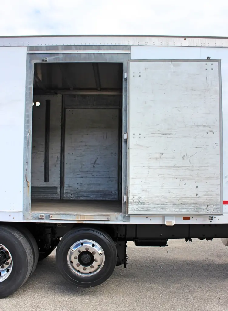 2018 Peterbilt 348 box truck – side cargo door open showing access to the interior cargo area