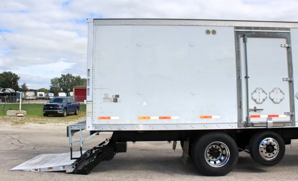 2018 Peterbilt 348 box truck – passenger-side rear section with Maxon liftgate lowered