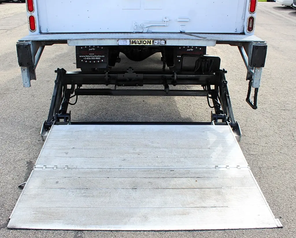 2018 Peterbilt 348 box truck – close-up of Maxon liftgate platform in the lowered position