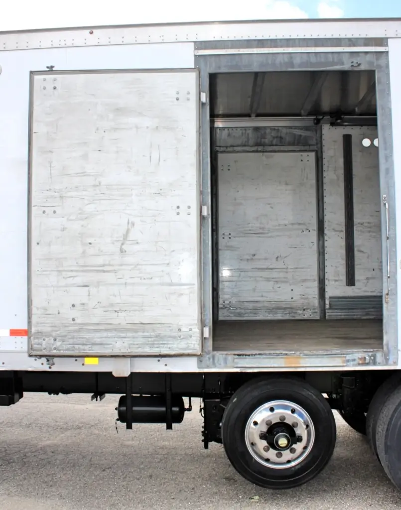 2018 Peterbilt 348 box truck – close-up of open side cargo door and interior access