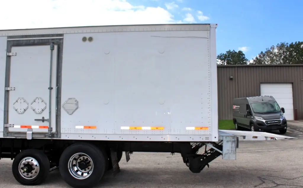 2018 Peterbilt 348 box truck – driver-side rear section with liftgate folded and stowed