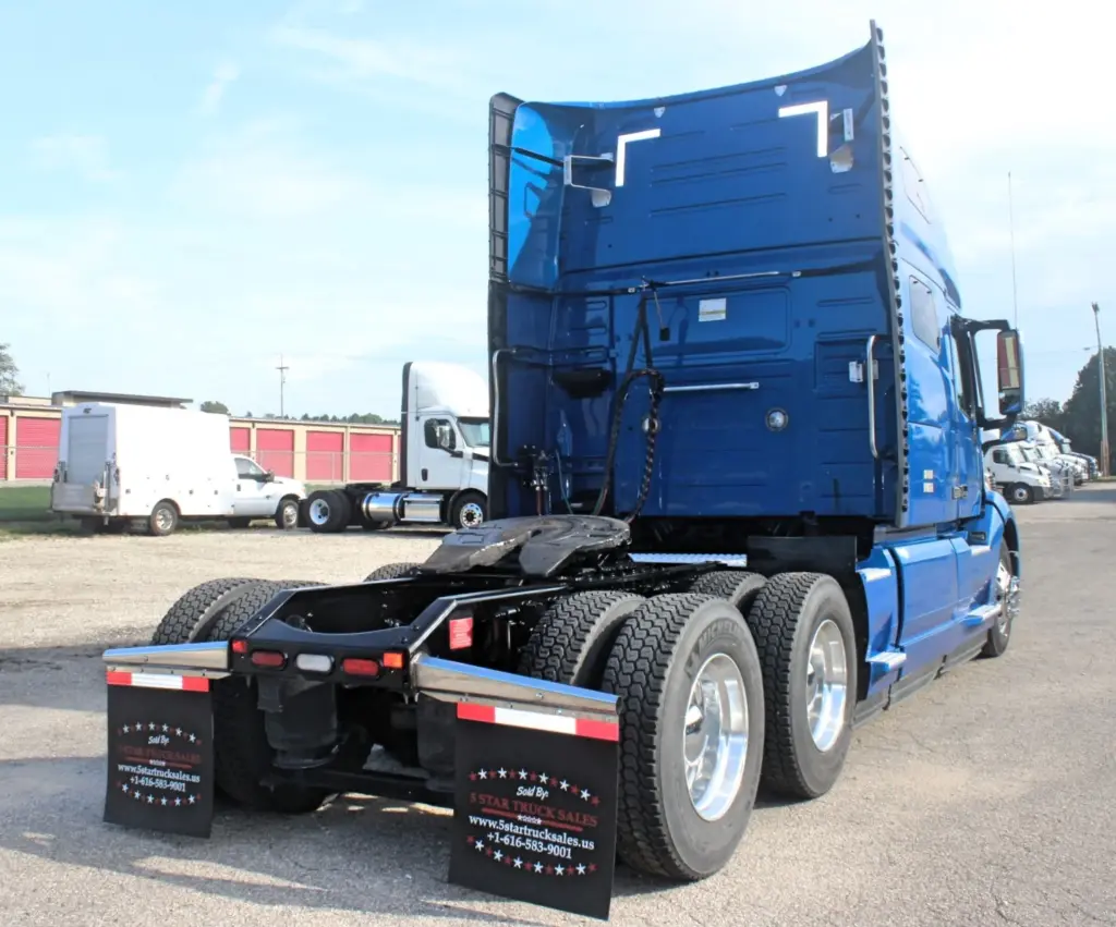 2024 Volvo VNL 760 sleeper semi truck - rear passenger side exterior view