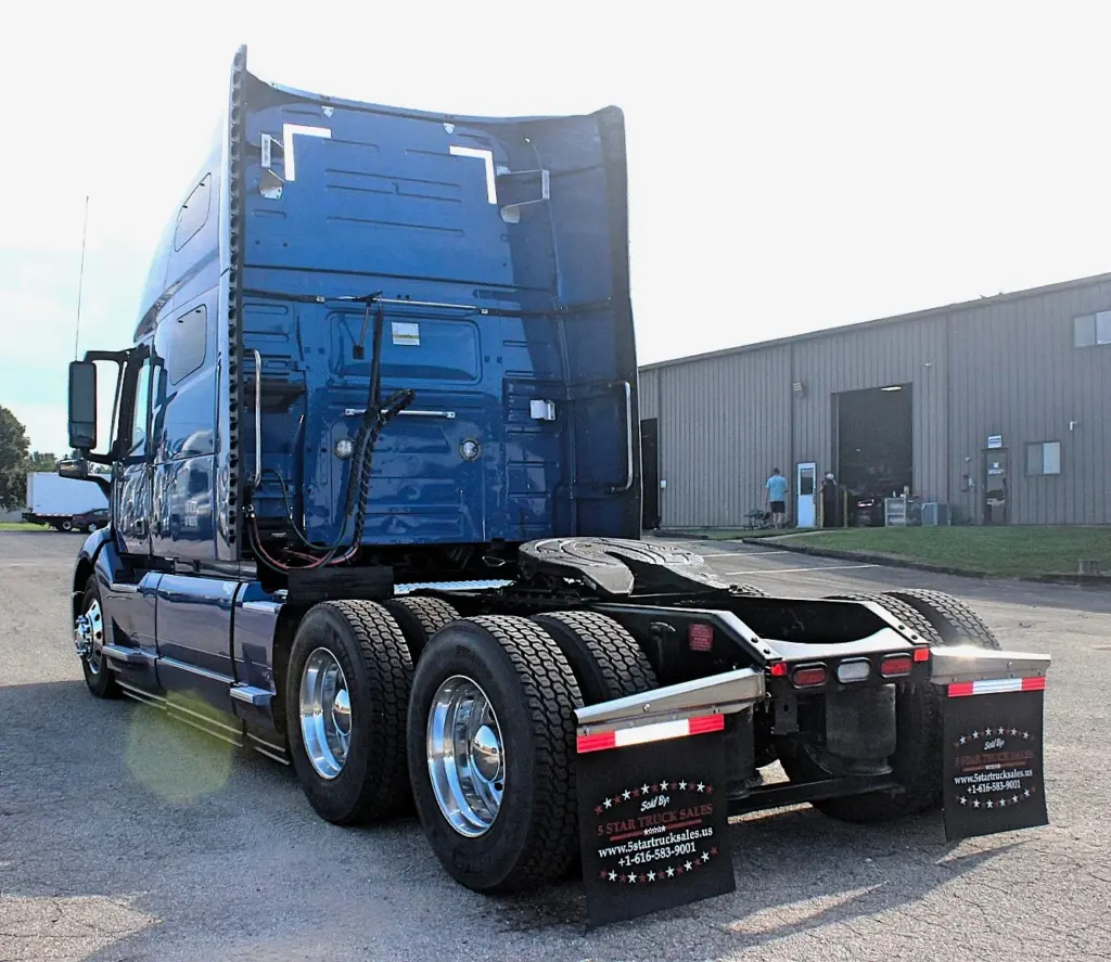2024 Volvo VNL 760 sleeper semi truck - rear driver side exterior view