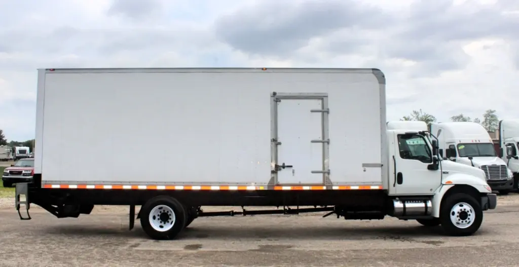2019 International MV607 box truck - side exterior view with cargo box