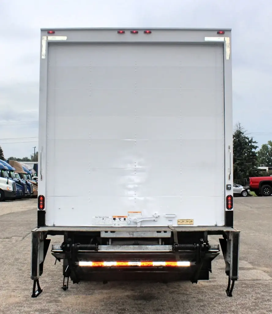 2019 International MV607 box truck - rear exterior view with roll-up door closed