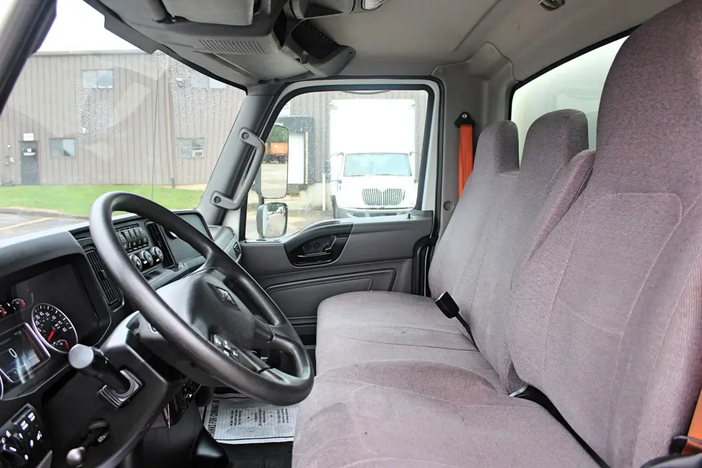 2019 International MV607 - driver and passenger seats with cab interior