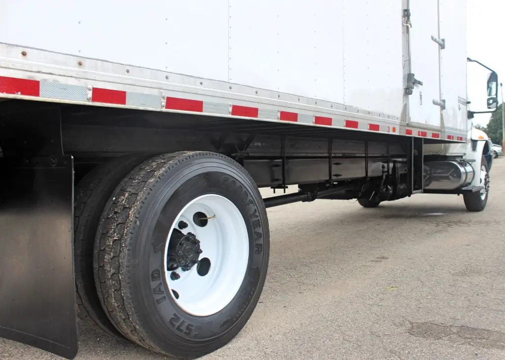 2019 International MV607 - rear wheel and lower cargo box close-up