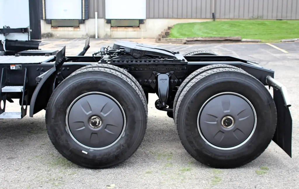 2019 Freightliner Cascadia 126 – driver-side tandem drive axles and rear wheels close-up