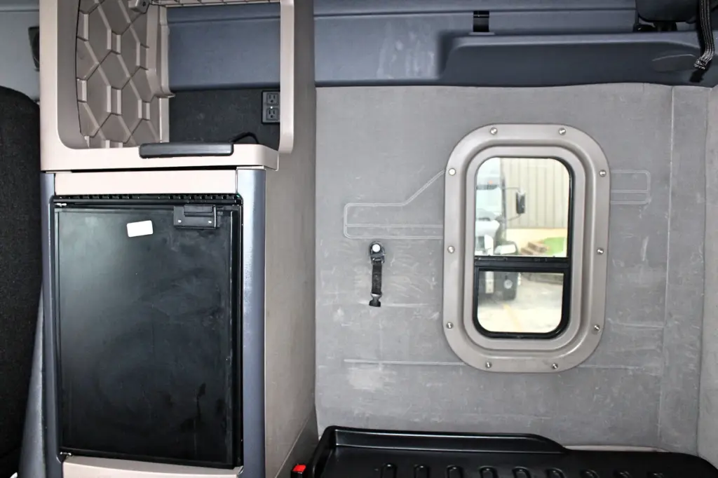 2019 Freightliner Cascadia 125 – Sleeper interior wall, refrigerator, and side window