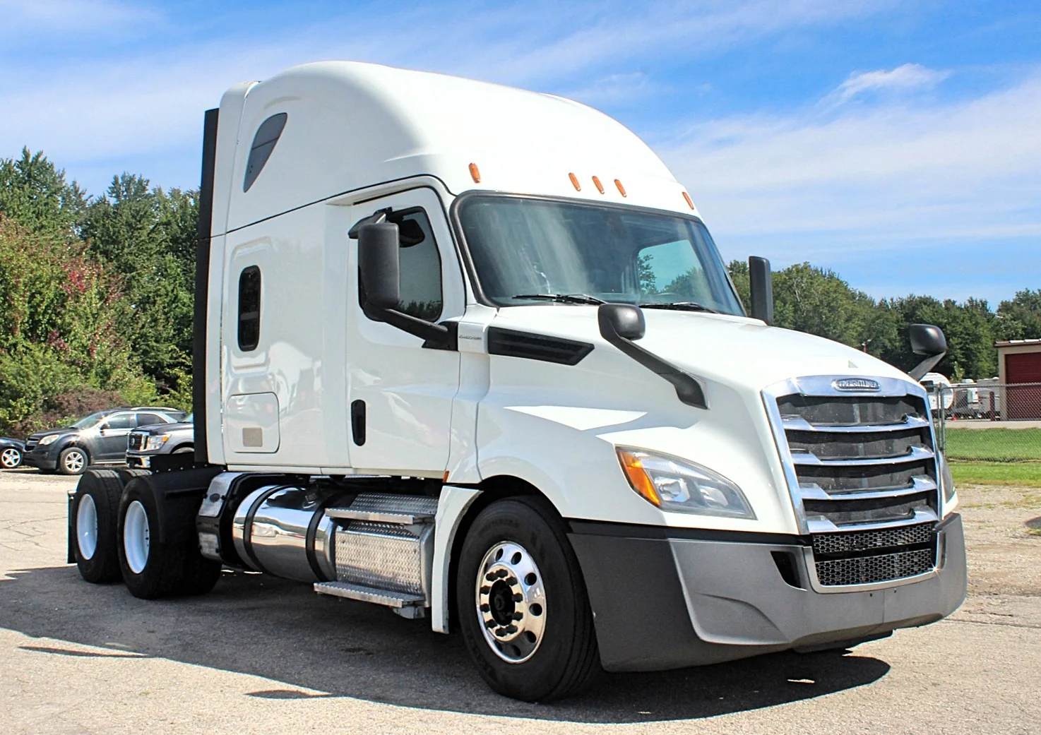 2020 Freightliner Cascadia 125 – white sleeper semi truck front passenger-side exterior view