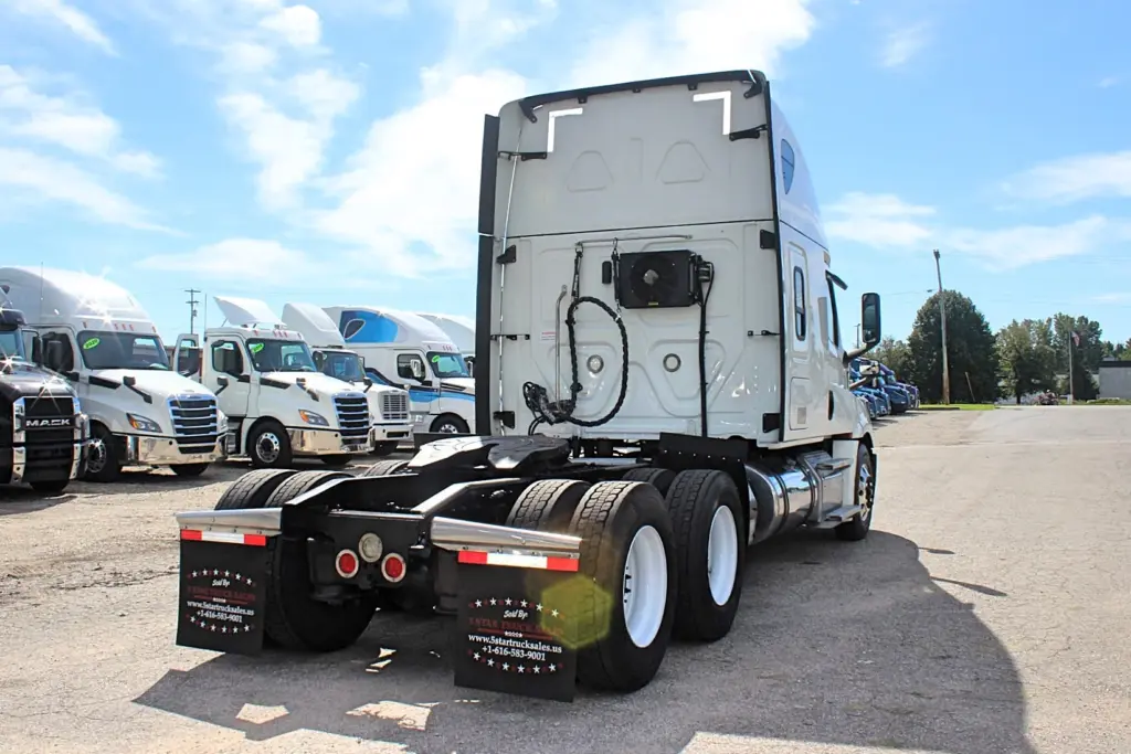 2020 Freightliner Cascadia 125 – rear passenger-side exterior view of sleeper cab and tandem chassis