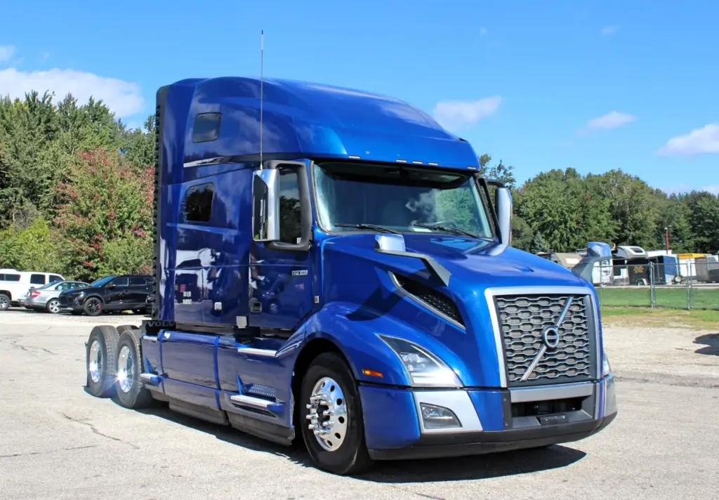 2020 Volvo VNL 760 – blue sleeper semi truck front three-quarter view