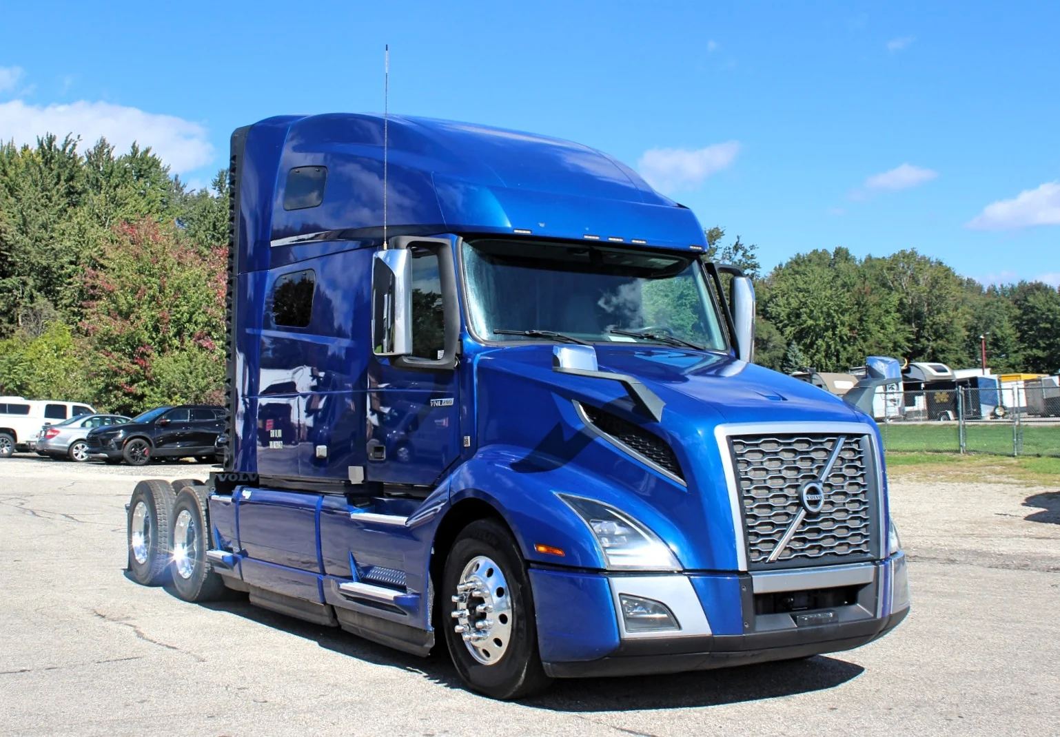 2020 Volvo VNL 760 – blue sleeper semi truck front three-quarter view
