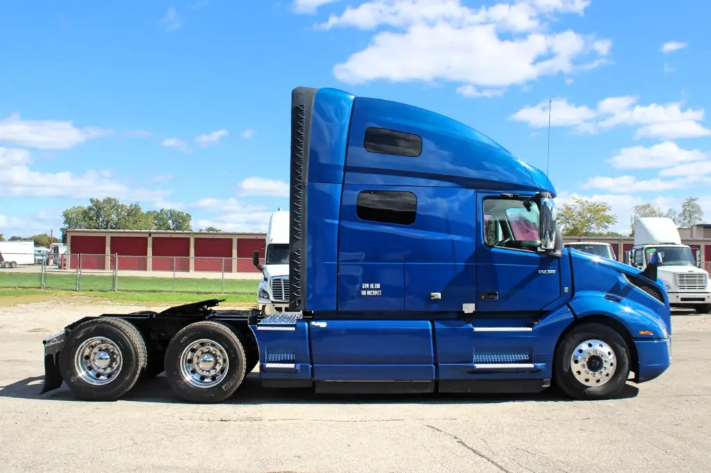 2020 Volvo VNL 760 – blue double bunk sleeper semi truck passenger side profile