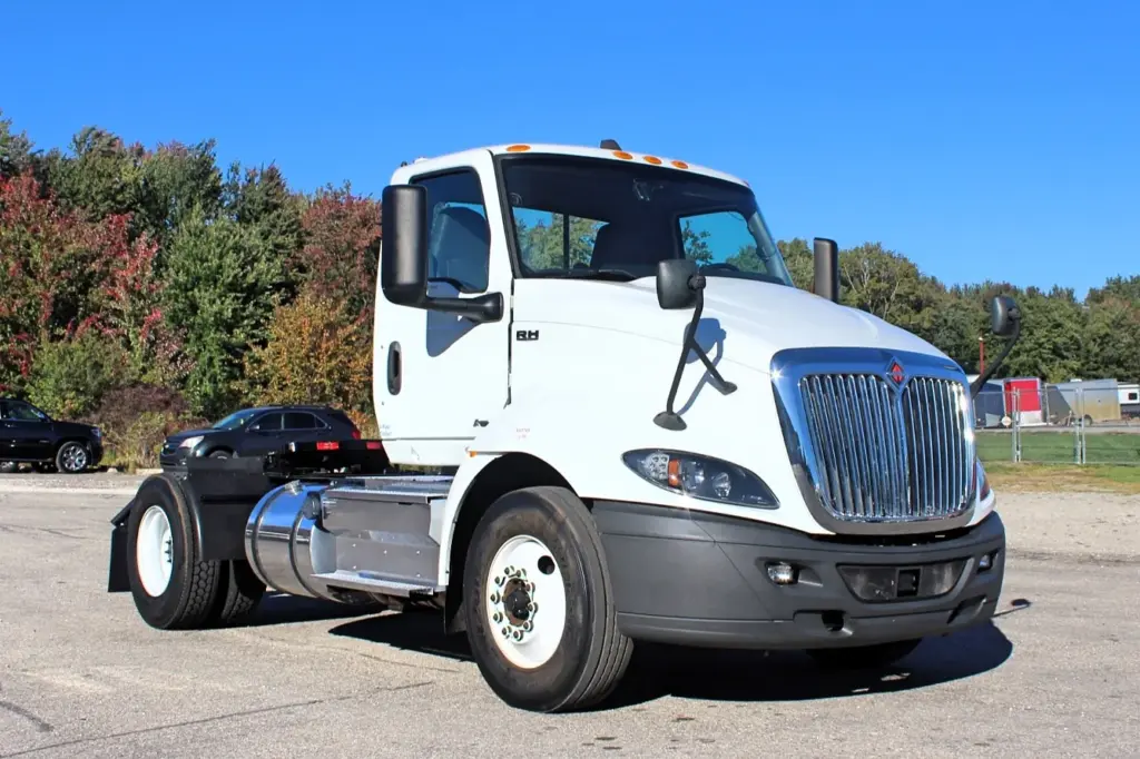 2020 International RH613 white day cab semi truck – front passenger-side exterior view