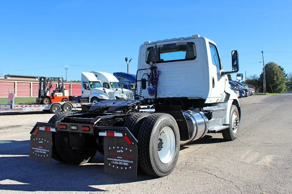2020 International RH613 used day cab semi truck – passenger-side rear three-quarter view