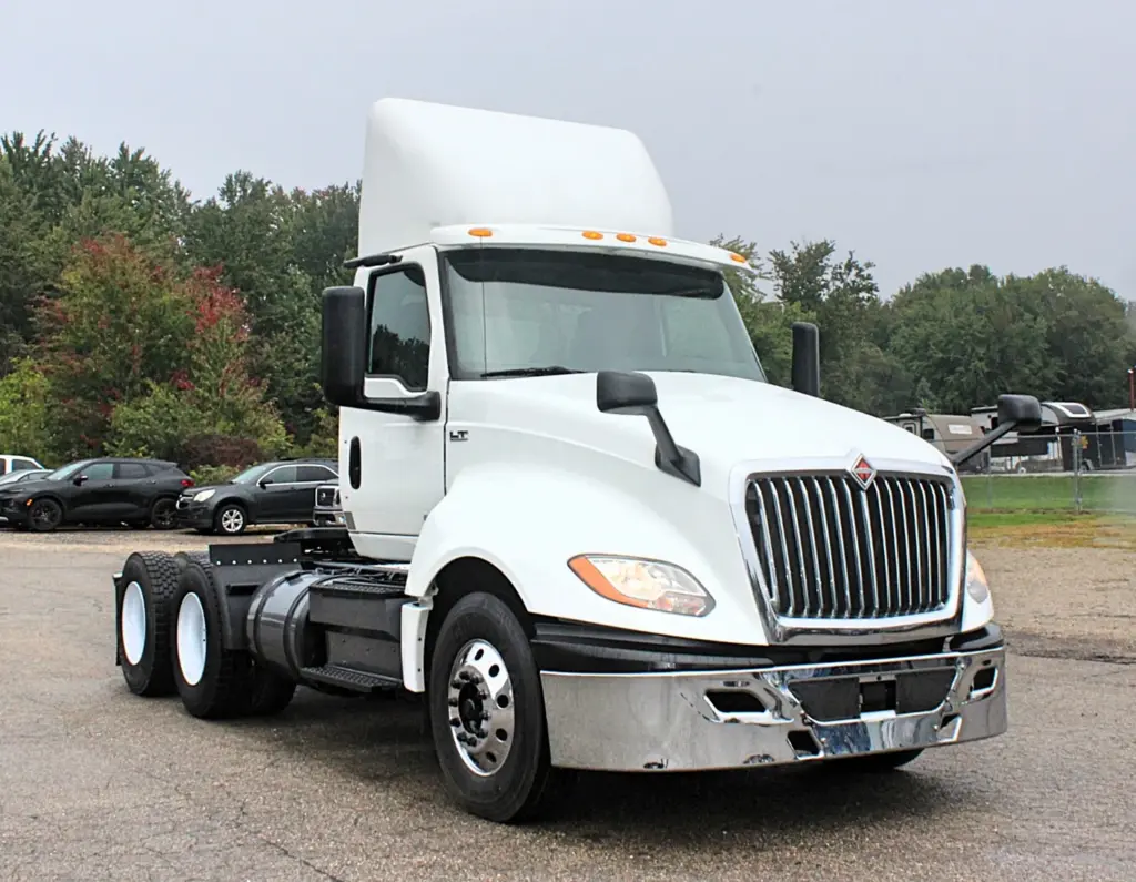 2019 International LT625 – white day cab semi truck front three-quarter exterior view.