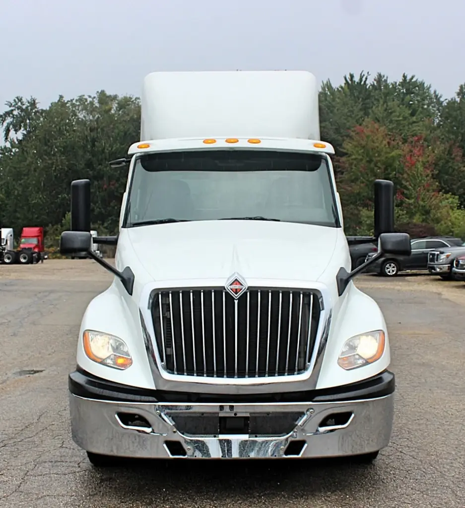 2019 International LT625 – straight front view with International grille and chrome bumper.