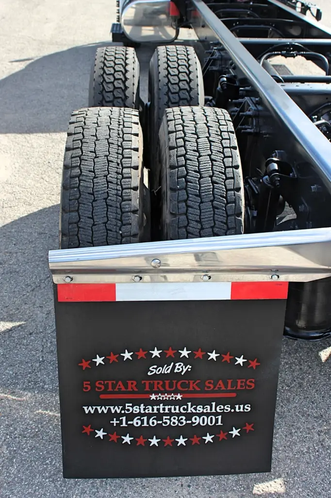 2020 International MV607 – rear dual tires and tandem axle chassis close-up