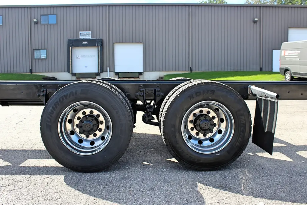 2020 International MV607 – driver side tandem rear wheels and chassis