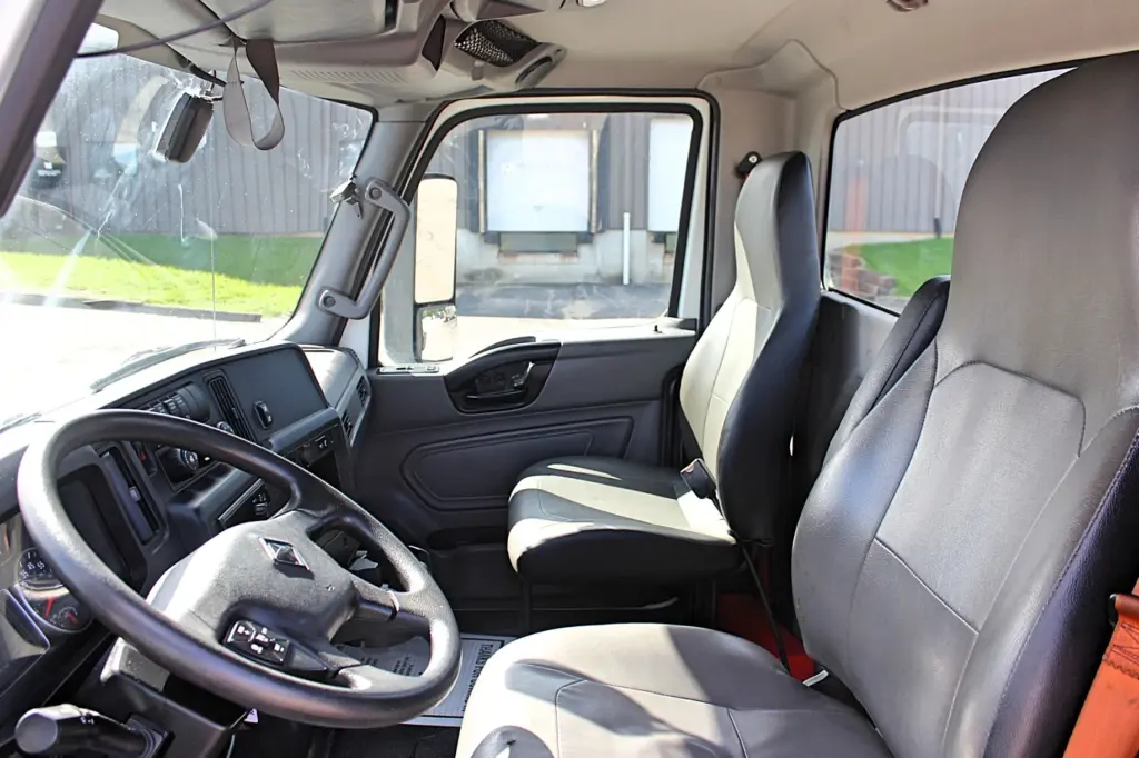 2020 International MV607 – clean driver and passenger seating inside cab