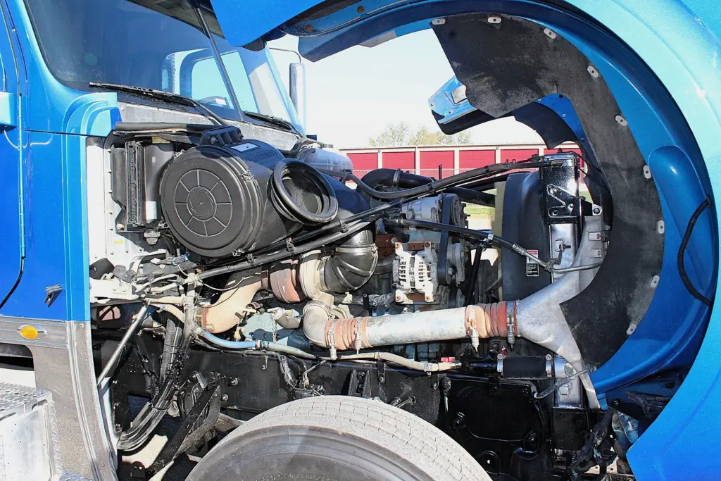 2016 Freightliner Coronado 132 — open hood showing the Detroit Series 60 engine, air cleaner and alternator