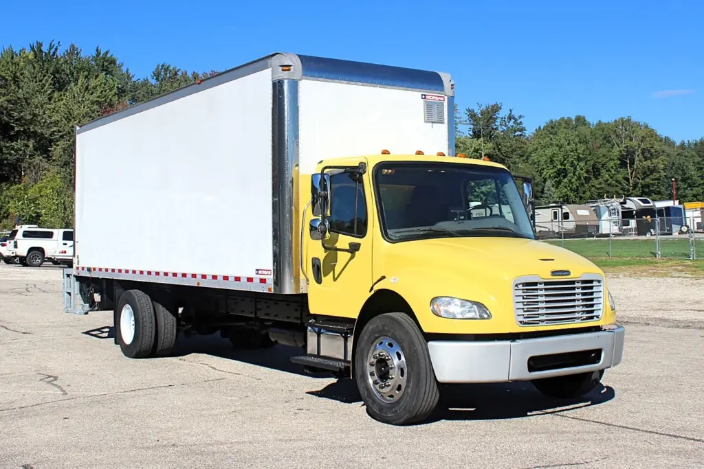 2016 Freightliner M2-106 Box Truck – front three-quarter view of yellow commercial box truck with Morgan cargo body.