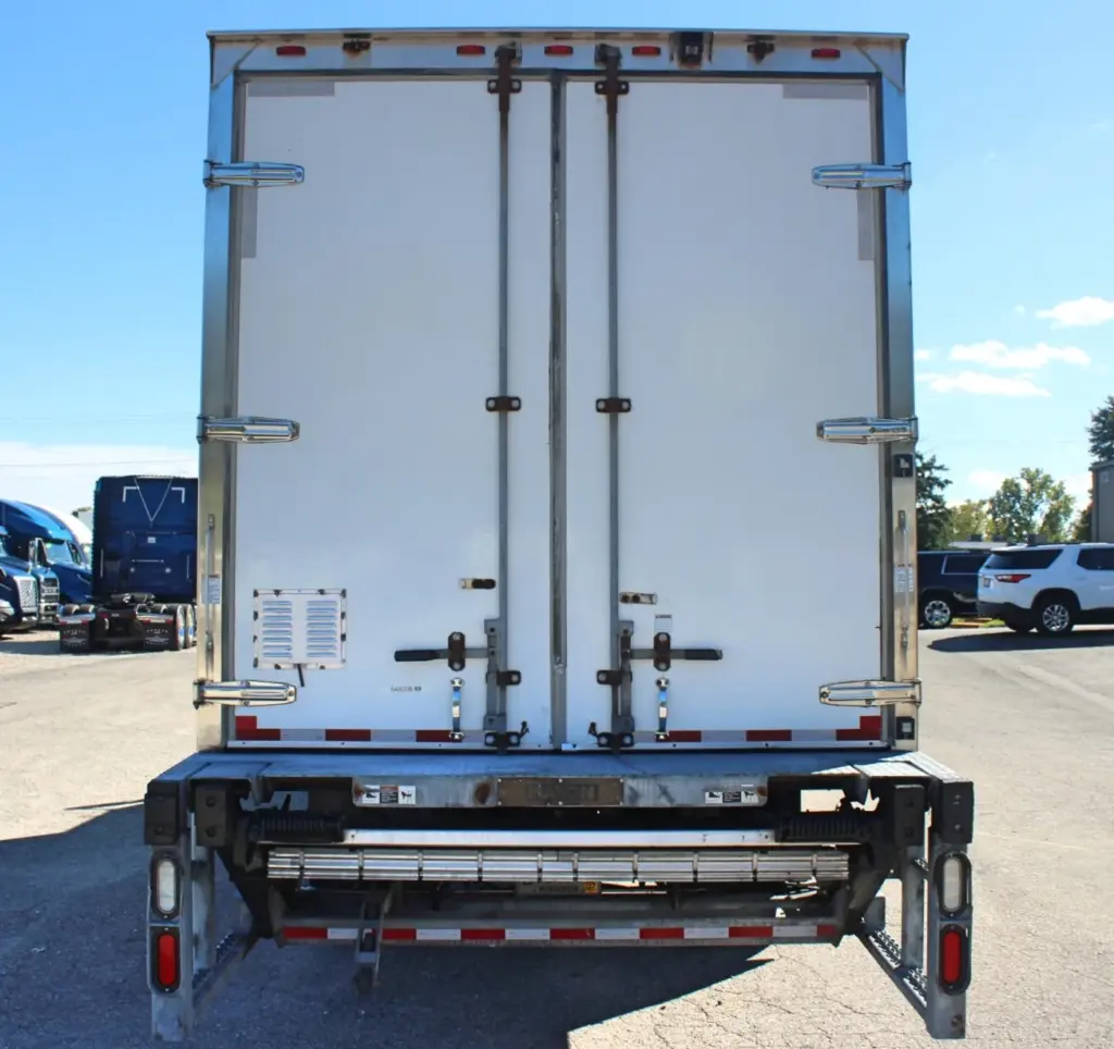 2016 Freightliner M2-106 Box Truck – rear view showing double swing doors and hydraulic liftgate assembly.
