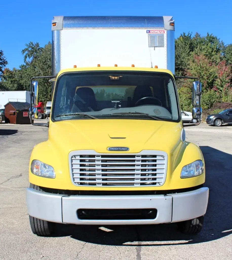 2016 Freightliner M2-106 Box Truck – straight-on front view showing Freightliner grille, headlights and cab.
