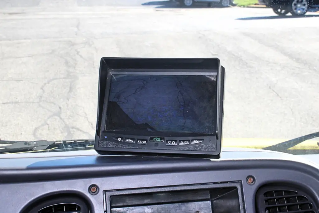 2016 Freightliner M2-106 Box Truck – in-cab rear camera monitor mounted above the dashboard.