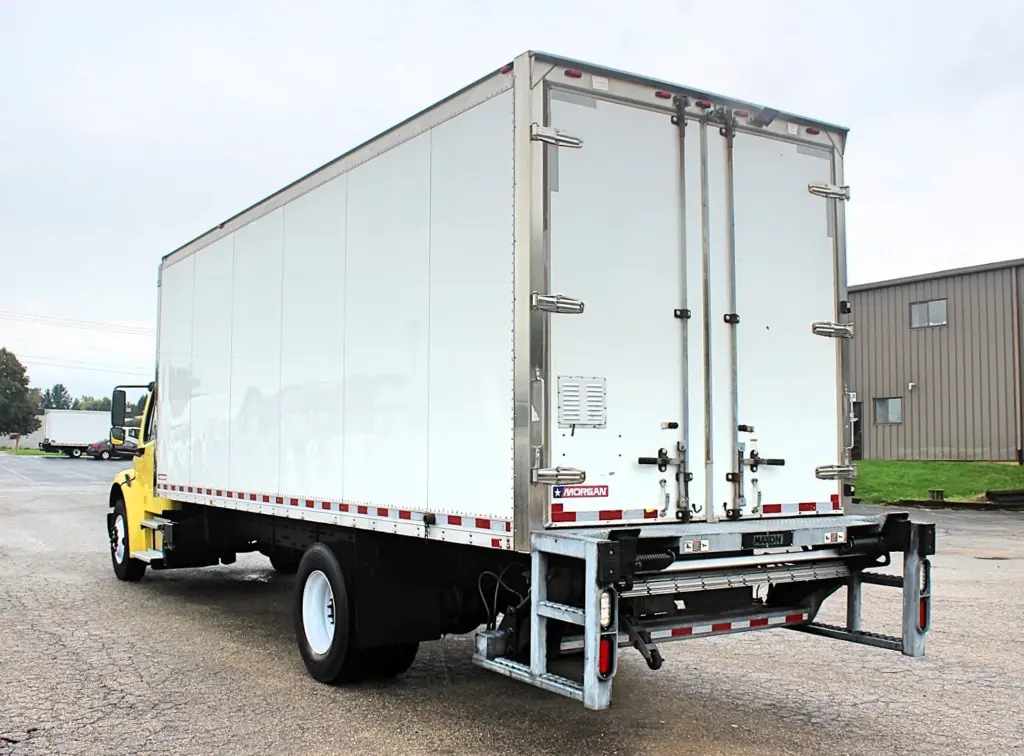 2016 Freightliner M2-106 box truck – rear driver-side exterior view with Morgan box and liftgate