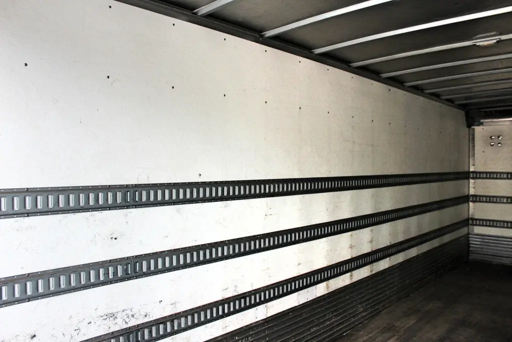 2016 Freightliner M2-106 box truck – interior cargo wall with multiple rows of E-track