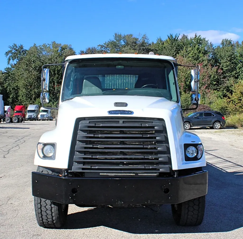 2018 Freightliner 114SD – straight front view of heavy-duty vocational truck with black steel bumper.