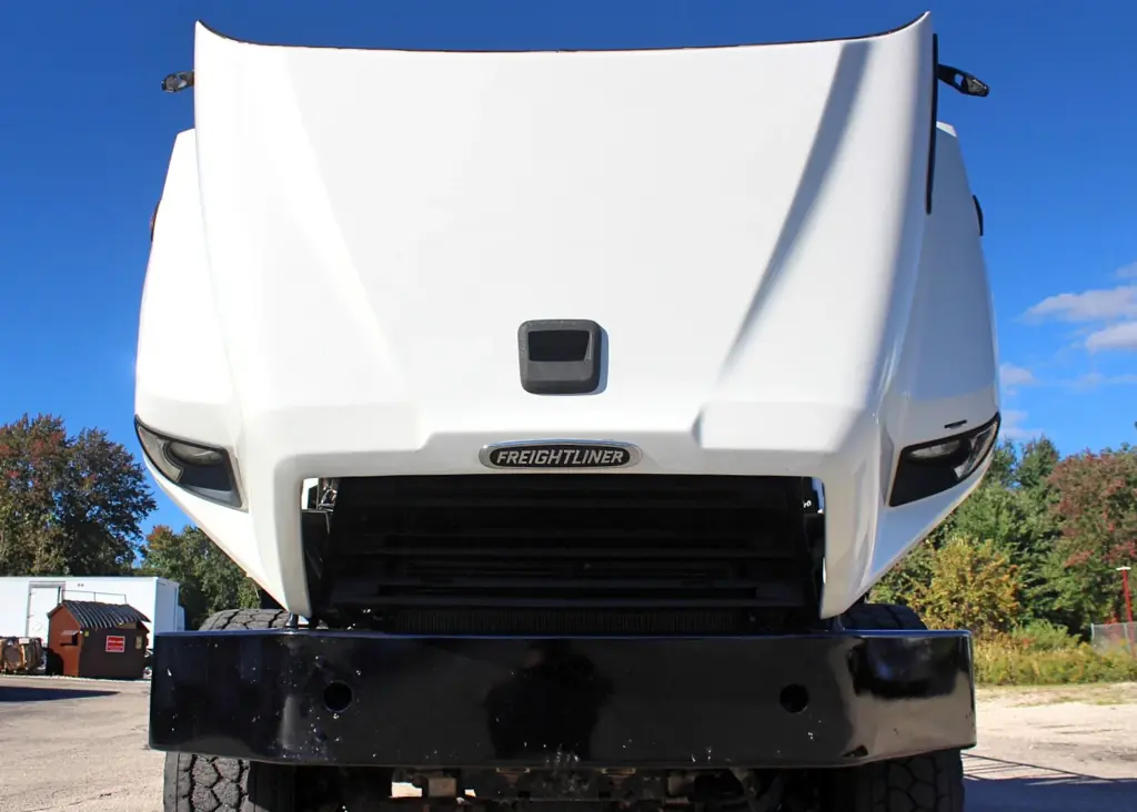 2018 Freightliner 114SD – front view with hood raised for engine and mechanical access.