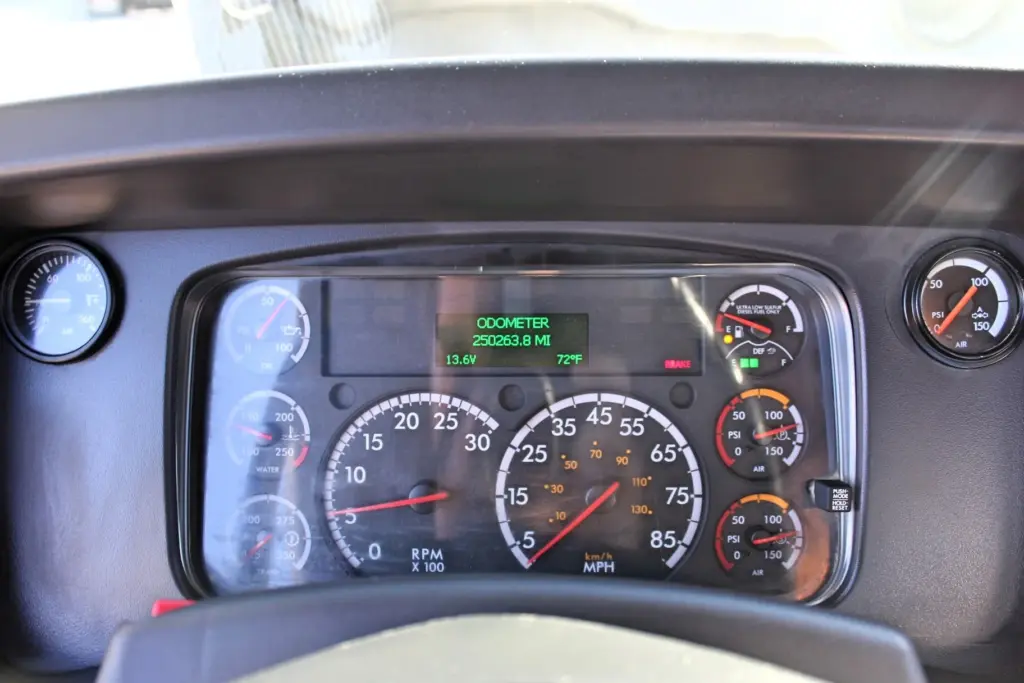 2018 Freightliner 114SD – instrument cluster and gauge panel showing approximately 250,000 miles.